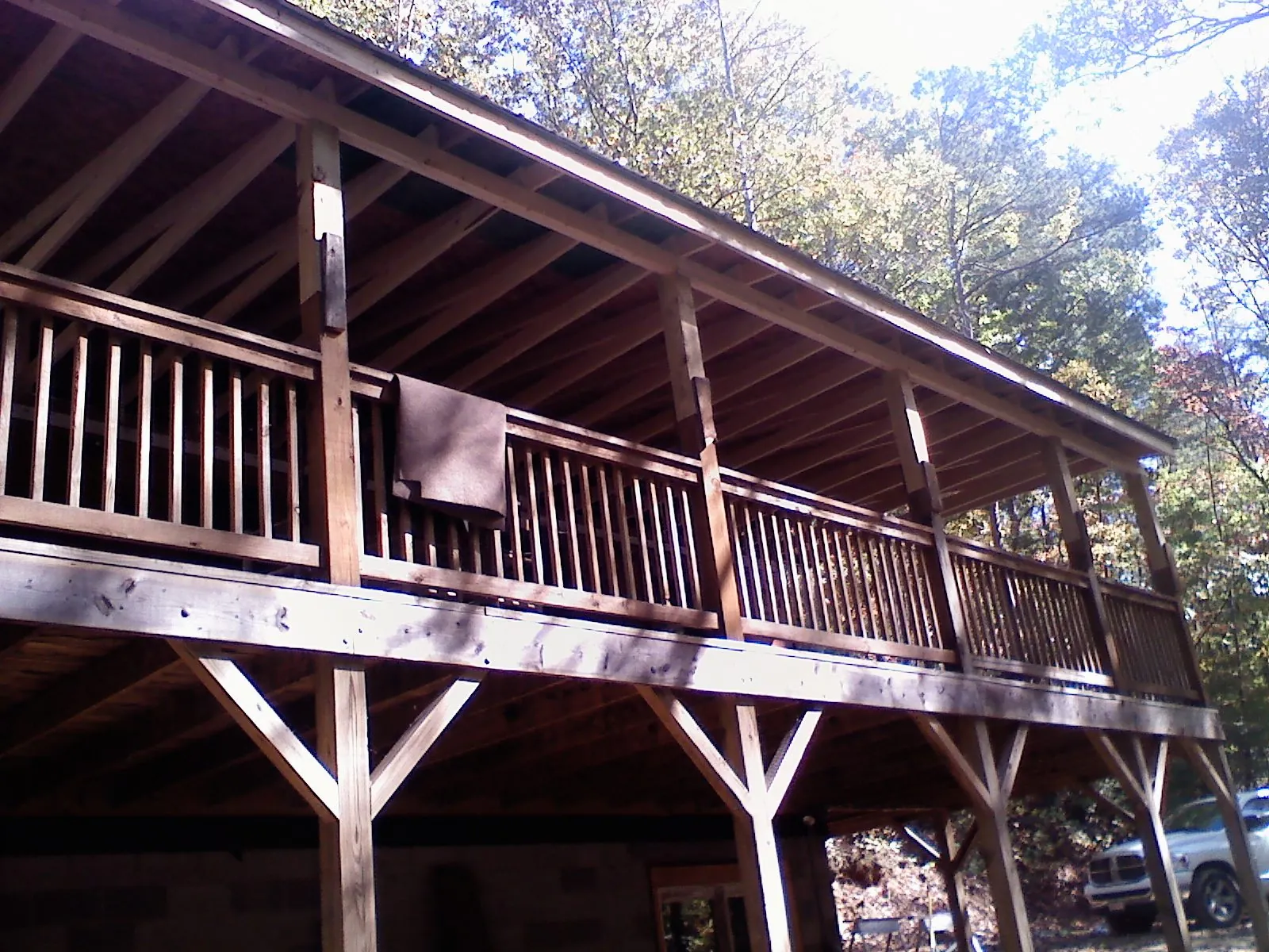 Timber framing under a new elevated porch and deck — Roof Leak Repair in Advance by Roofing Brothers